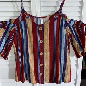 Red, yellow, and blue shirt